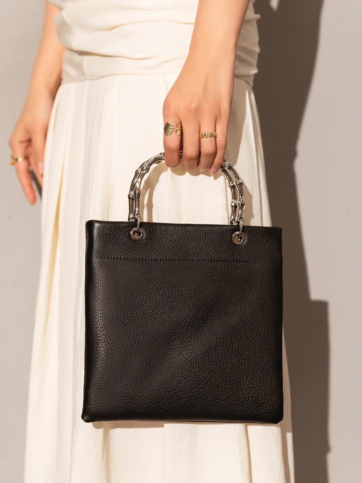 Minimalistic Top Structured Square Limited edition range Handle Custom-built Bag